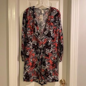 H&M floral romper. Never worn, tags attached. Size 12.